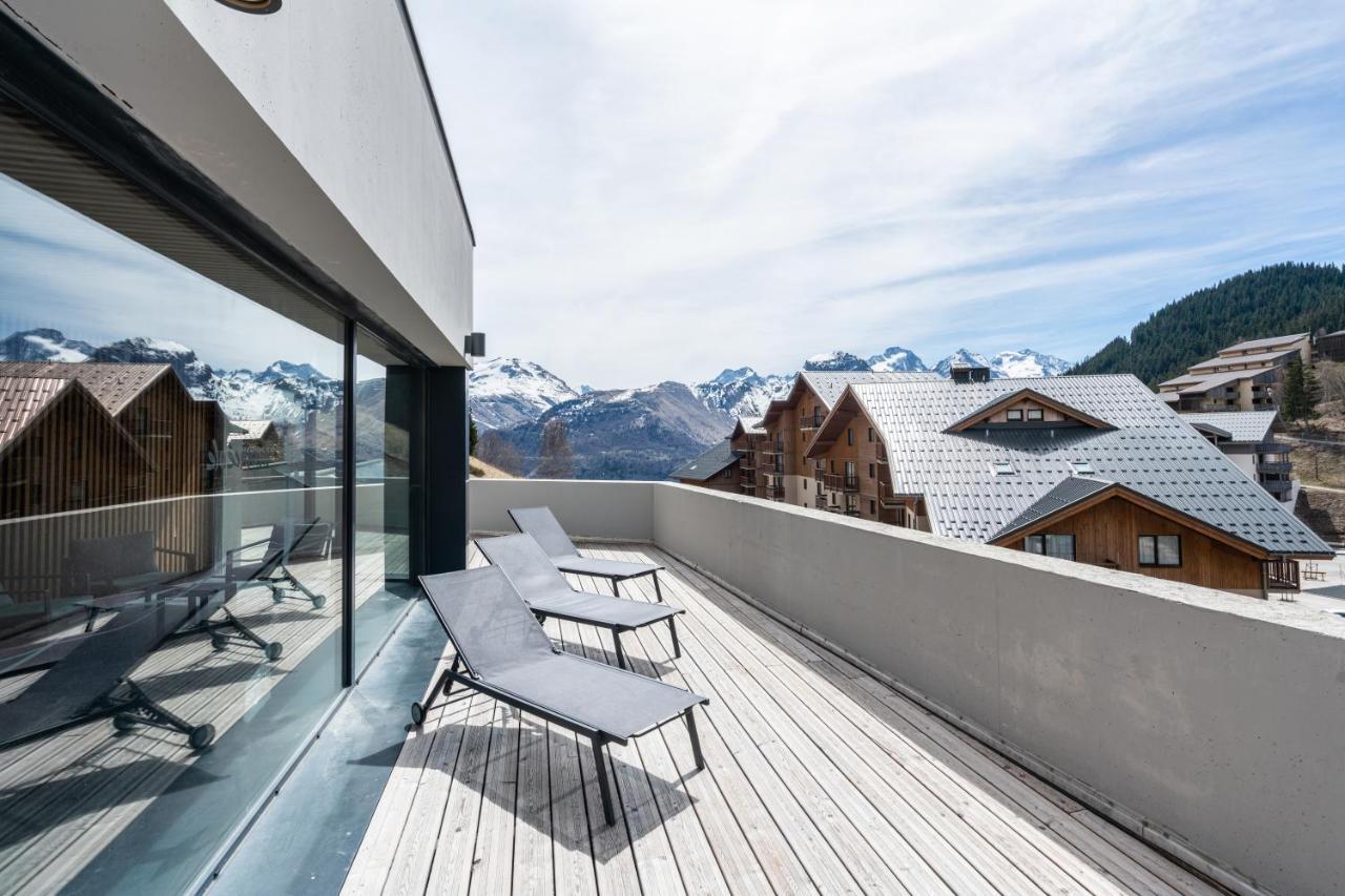 Vacancéole - Les Ecrins d'Auris Esterno foto