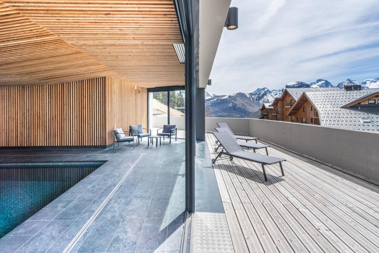 Vacancéole - Les Ecrins d'Auris Esterno foto
